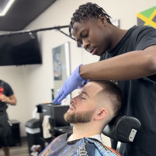 Adrian — owner and barber at WRTHY CUTS